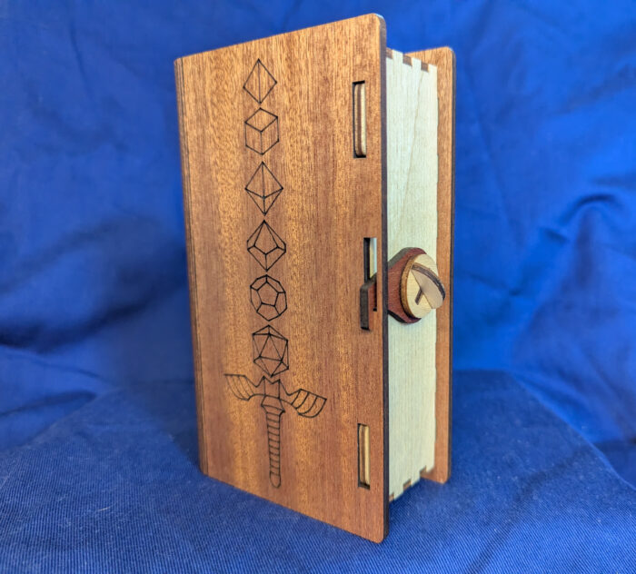 A book shaped case for a dice tower